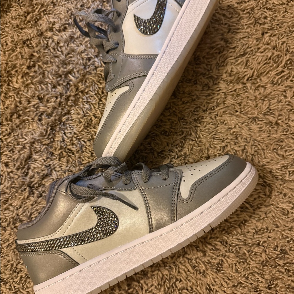 Size 5y, women’s 6.5 Nike Air Jordan 1 Low Gray & White with Crystal Swoosh
